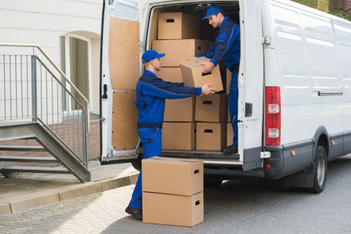 Team assessing risks before lifting and transporting furniture