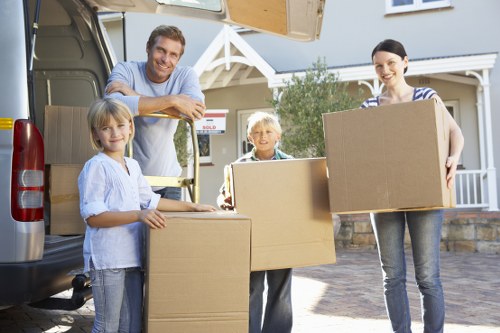 Packed boxes and moving day logistics in Kingston upon Thames