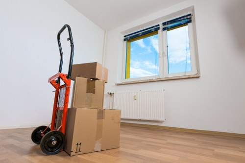 Moving sofas and wardrobes from a Kingston flat with stair access
